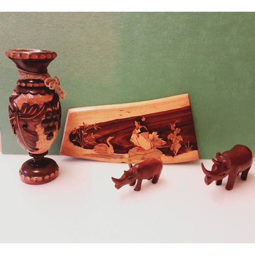 722 - Carved Wooden Vase, 2x Wooden Rhinos and a Plaque.