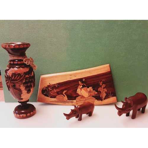 722 - Carved Wooden Vase, 2x Wooden Rhinos and a Plaque.