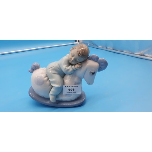 696 - Nao Boy On Rocking Horse