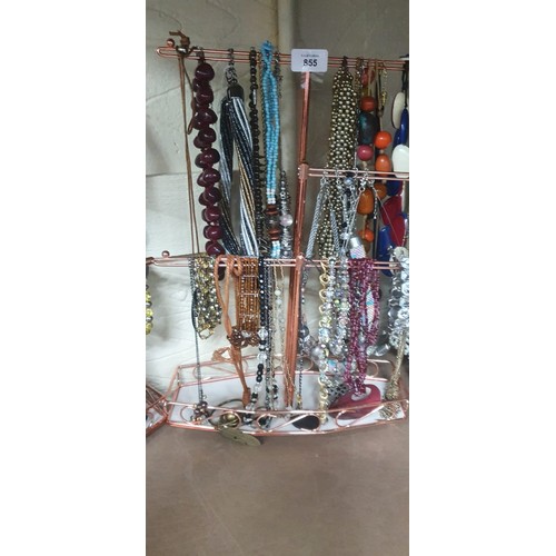 855 - Stand of Fashion/Vintage Jewelry To Include Necklaces and Bracelets. (stand not included)