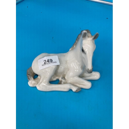 249 - Lomosou Russian Horse Lying Down With A Grey Mane and White Body