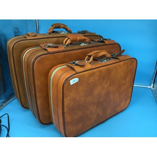 34 - Set Of 3 Suitcases In Burnt Orange