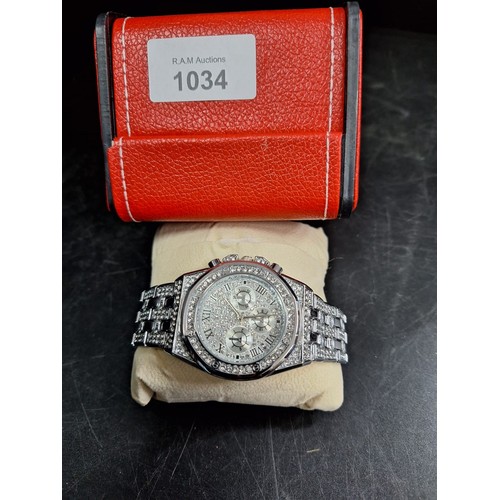 1034 - Boxed red crystal designer watch ladies