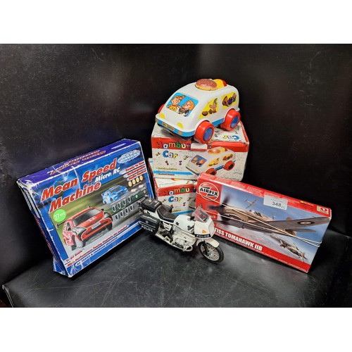 348 - 2 Vintage Boxed Micro Rotation Cars