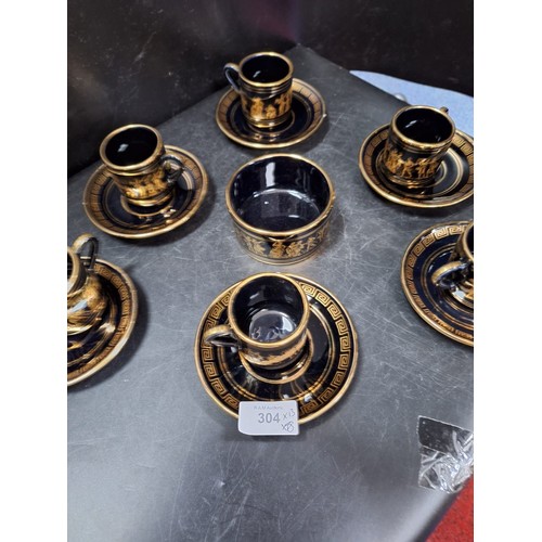 304 - 6 Cups, Saucers and A Bowl Greek With Gold Guilding