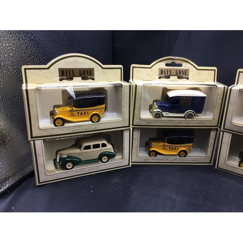 46 - Collectible Boxed Cars x8