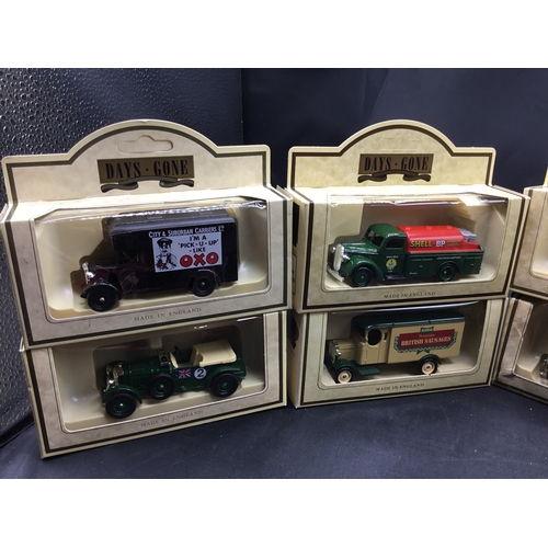 48 - Collectible Boxed Cars x8