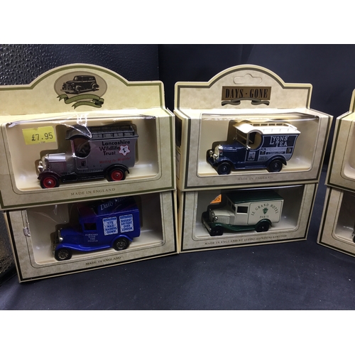 49 - Collectible Boxed Cars x8