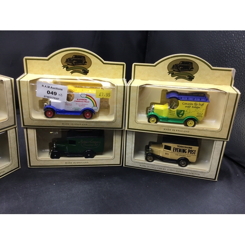 49 - Collectible Boxed Cars x8