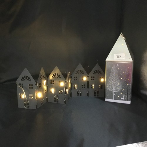 287 - Light Up Christmas street Scene In Working Order - New Batteries Added and a tea light tin