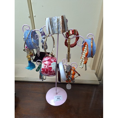 240 - Stand Of Various Fashion and Vintage Jewelry (stand not included)