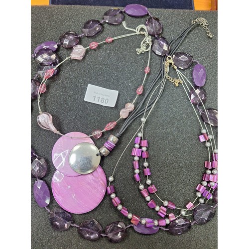 1180 - Pad Of Fashion and Vintage Jewelry To Include Purple Necklaces