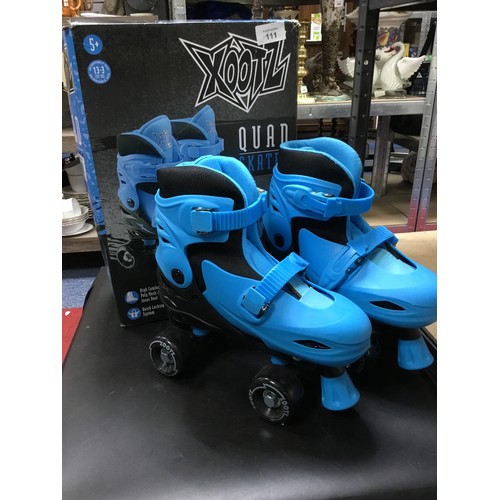 111 - Blue Quad Skates Size 12-13