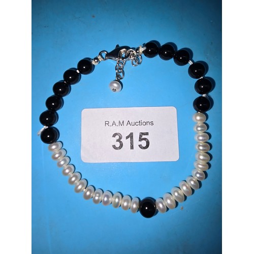 315 - 925 Silver Pearl and Jade Type Bracelet