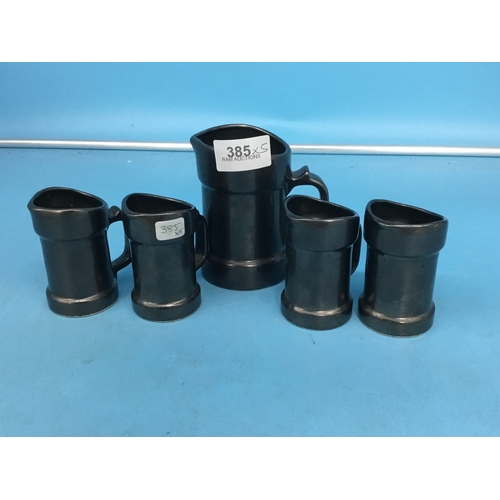 385 - Pottery Jug and 4 Pottery Tankards