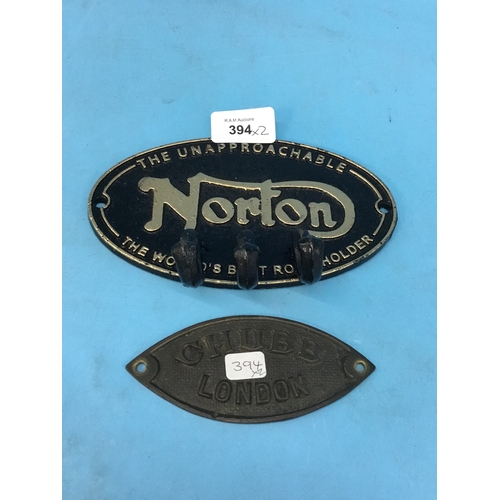 394 - Cast Iron Norton Coat Hook and Chubb Sign