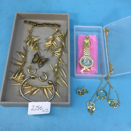 256 - Fashion and Vintage Jewellery to Include Necklaces, Earrings, Brooches, Chains and a Watch