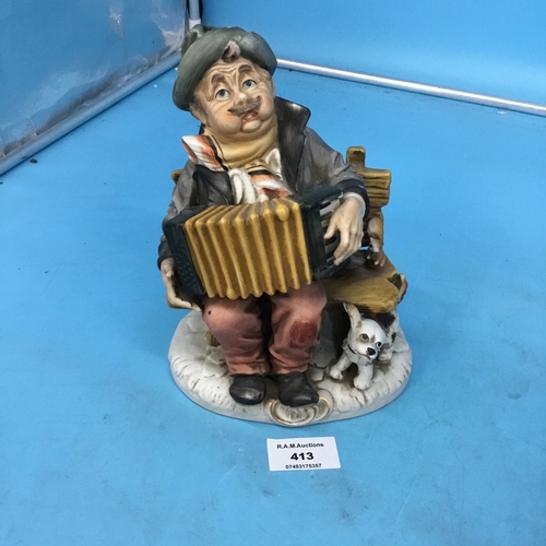 413 - Genuine capo figure man+dog with accordion on bench 7”x6”