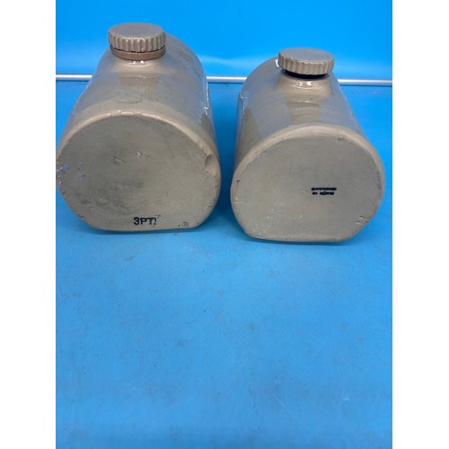 461 - 2x stone water bottles vintage