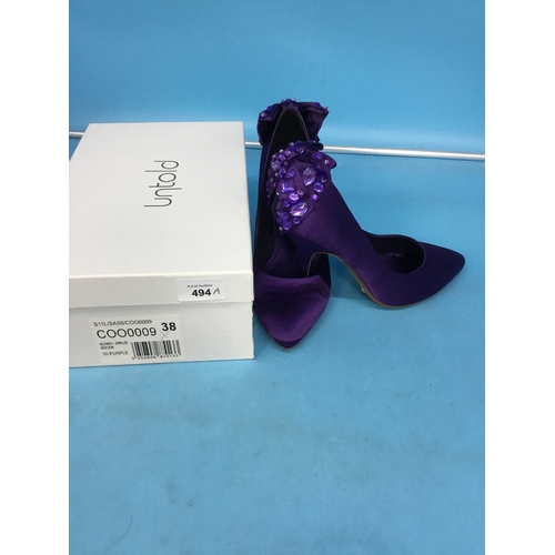 494A - New in box size 5/38 untold purple diamanté back