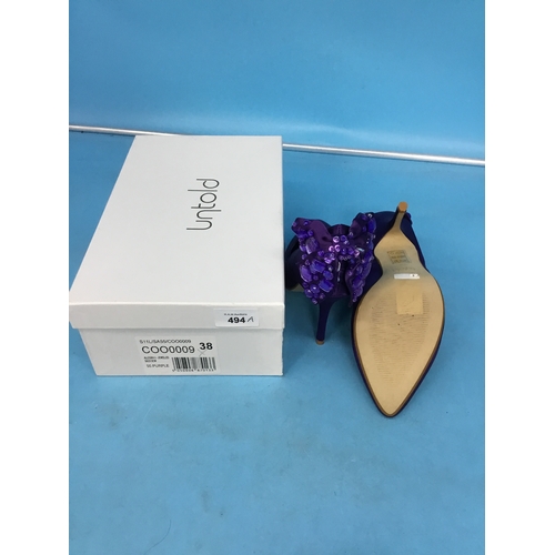 494A - New in box size 5/38 untold purple diamanté back