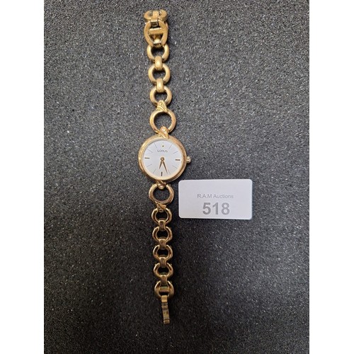 518 - Genuine ladies lorus gold+stars watch