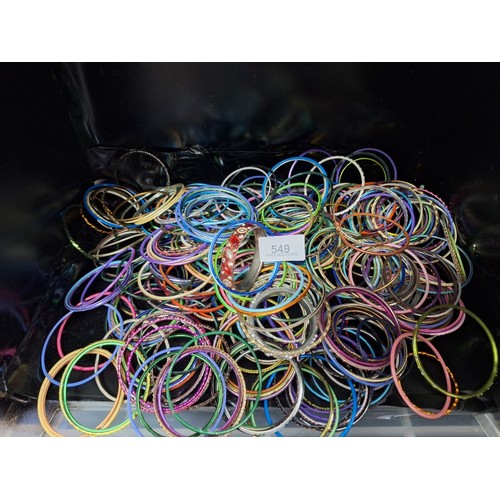 549 - Bag full of fashion bangles 100s