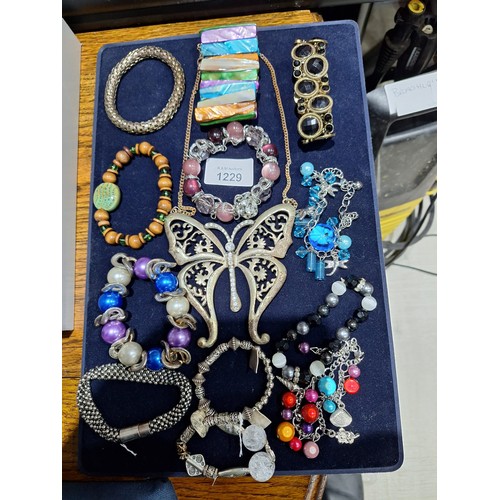 1229 - Fashion and Vintage Jewellery (stand not included)