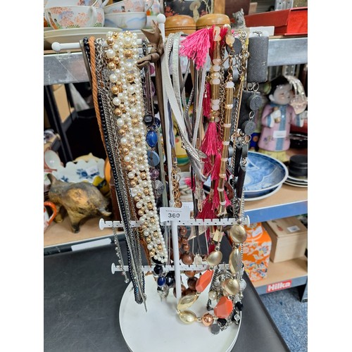 360 - Stand of Fashion and Vintage Jewellery (stand not included)