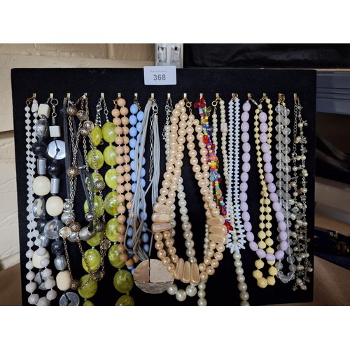 368 - Stand of Fashion and Vintage Necklaces and Chains (stand not included)