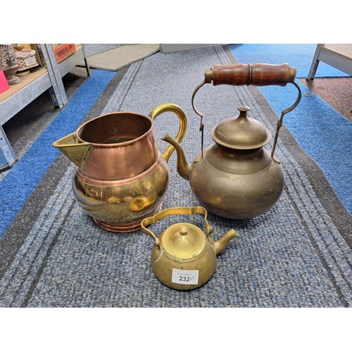 232 - Three Brass and Copper Jugs