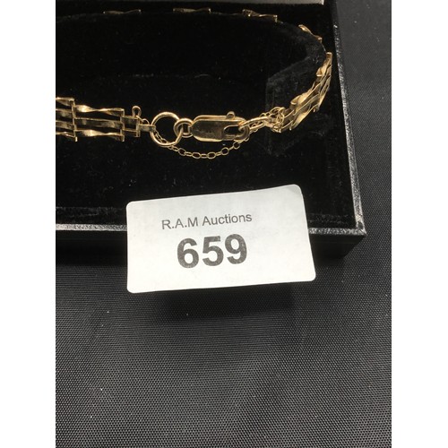 659 - 9ct solid gold gate bracelet marked