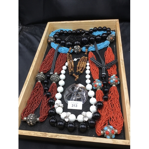 313 - Large tray of f+v jewellery inc. Indian vintage necklace,pendants,