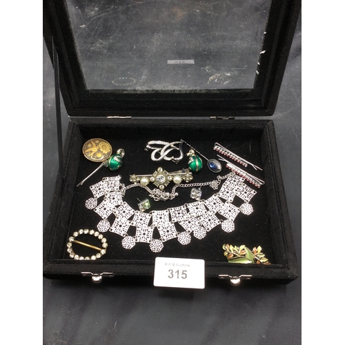 315 - Tray of f+v jewellery to inc. brooches,clips,necklaces,buckle,earrings,pins