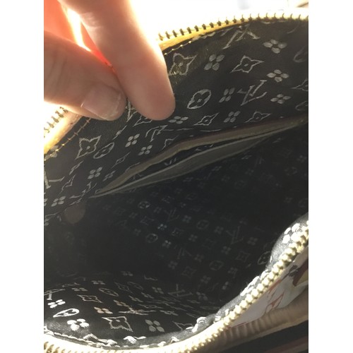 1033 - Genuine presented as Louis vitton bag