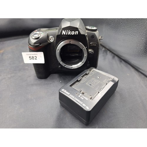 582 - Nikon Camera Body D70s and a Nokia Quick Charger