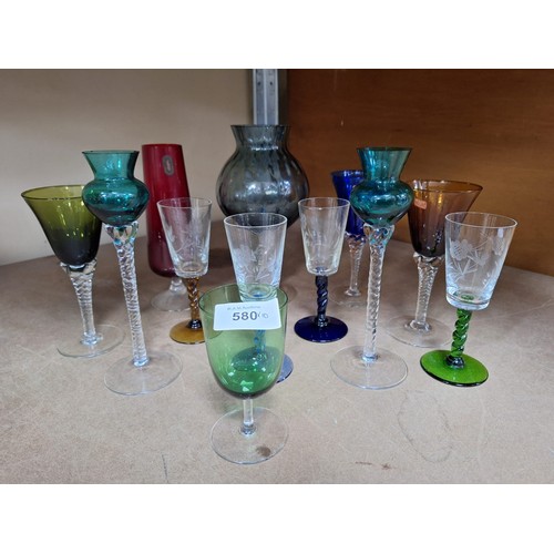 580 - Group of coloured glass to inc. glasses,stemvases,bud vases etc