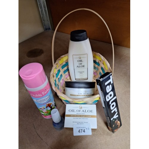 474 - Beauty products in basket+ dog tags