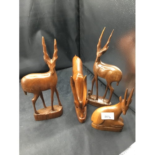 809 - 4x carved wooden stags