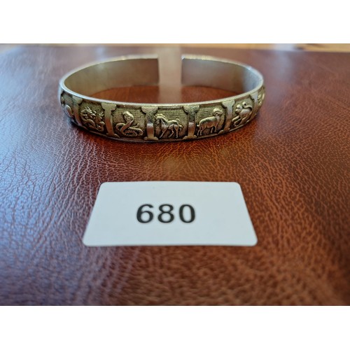 680 - Presented as Chinese solid silver heavy bangle/bracelet has marks