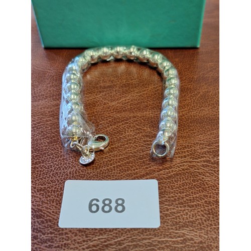 688 - Presented as Tiffany +Co bracelet still sealed