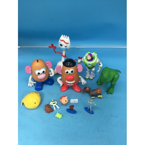 143 - Toy Story Figures To Include Mr and Mrs Potatoe Head, Rex Dinosaur, Buzz Lightyear, Spoon and Access... 