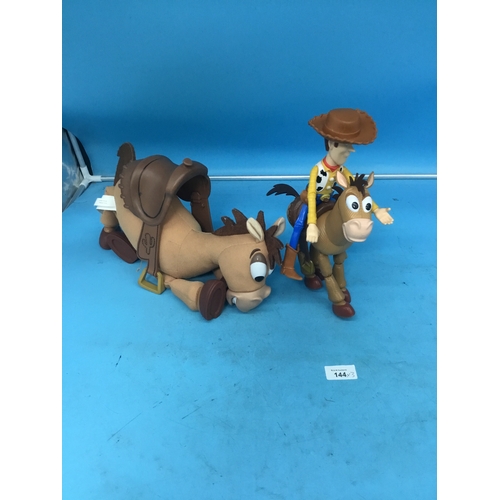 144 - Toy Story Woody on Bullseye and a Large Soft Bullseye With Saddle