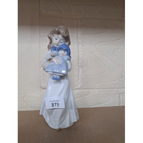 879 - 8” Nao Girl Holding A Rag Doll