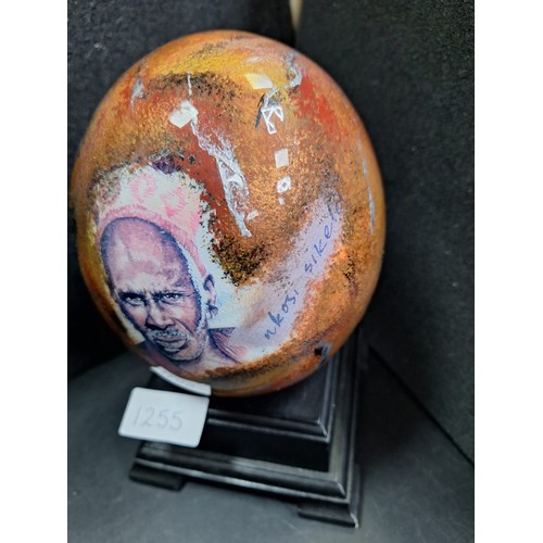 1255 - Hand Painted and Signed Ostrich Egg On a Stand  NKOSI SIKELLE