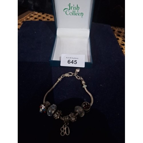 645 - Boxed 925 Silver Charms On a Bracelet