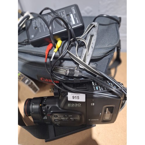 915 - Cased Canon E230 Camera Recorder With Flash and all Leads