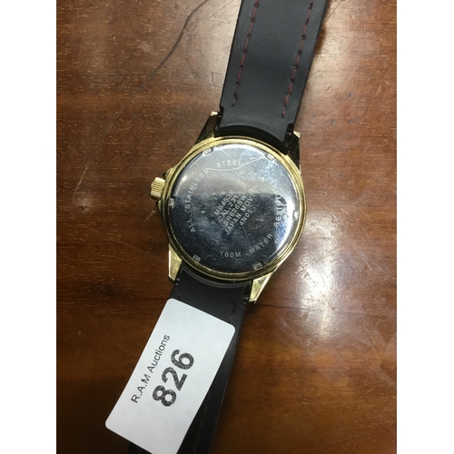 826 - Accurist 100m  water resistant rubber. Strap black/gold watch