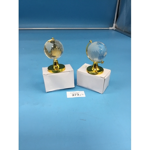 373 - 2x miniature glass world globes