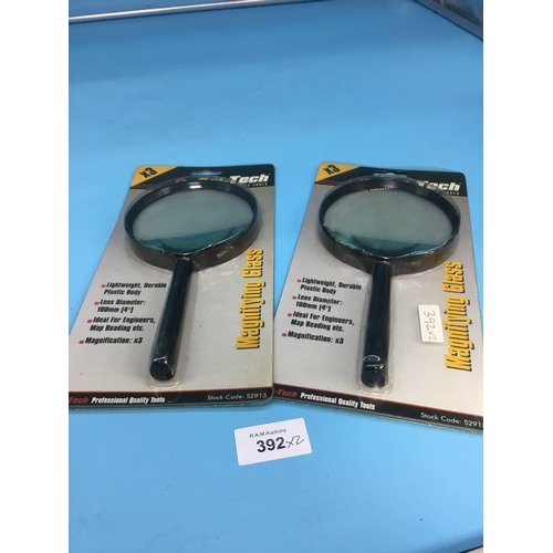 392 - 2x large lightweight magnifying glass